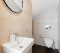 Seperate with toilet, sink & washing machine