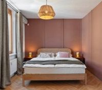Master bedroom pink wall double bed