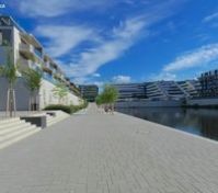 Waterfront walkway beside building