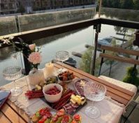Balcony dining river view sunset