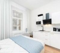Studio bed and kitchen view