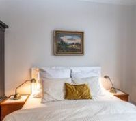 Double bed with cozy lighting
