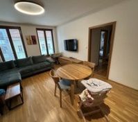 Bright living room with dining table