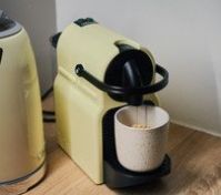 Nespresso machine brewing coffee