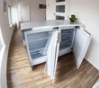 Kitchen island with refrigerators open