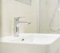Bathroom sink faucet close-up