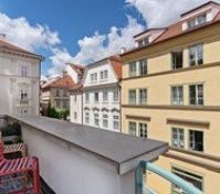 Balcony overlooking historic Prague buildings