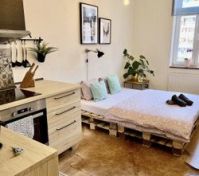 Studio open plan kitchen bed area