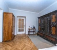 Bedroom with vintage carved wardrobes