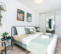 A fun and immersive jungle-themed bedroom, featuring lush green decor, jungle-inspired wall art, and dinosaur accents. Cozy bedding, playful details, and an adventurous atmosphere make it perfect for kids and dinosaur lovers alike!