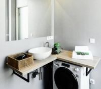 Bathroom with sink and washing machine