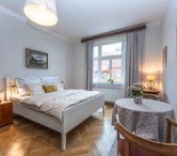 Bright bedroom with double bed