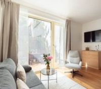 Sunny living room with terrace view