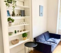 Living room shelving and sofa