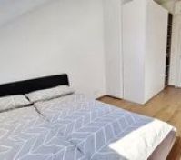 Bedroom with wardrobe and bed