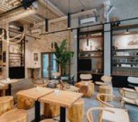 Stylish cafe with wooden furniture