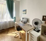 Desk workspace by sunny window