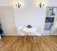 Dining table with kitchen doorway