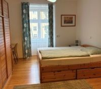 Bedroom with wooden bed