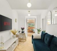 Bright living room with Netflix TV