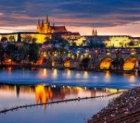 Famous Charles bridge. Its a historic bridge that crosses the Vltava river in Prague. Its construction started in 1357 under the auspices of King Charles IV, and finished in the beginning of the 15th century.