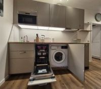 Kitchen with dishwasher and washer