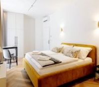 Studio overview with wardrobe and desk