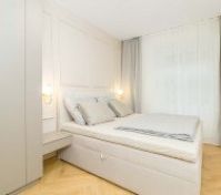 Large wardrobe and comfy bed with storage space