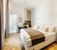 Bright studio bedroom with kitchenette