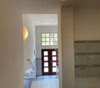 Building entrance hallway with mailboxes