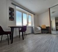 Dining area with table and chairs