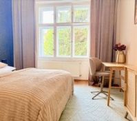 Bedroom with window and desk