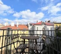 Balcony seating with sky view