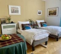 Room with two single beds