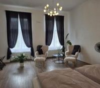 Spacious bedroom with seating area