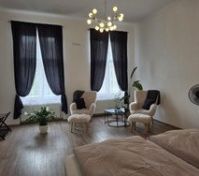 Spacious bedroom with seating area