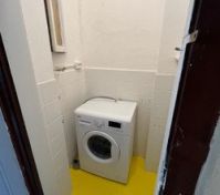 Private laundry and storage. (over the building corridor) 