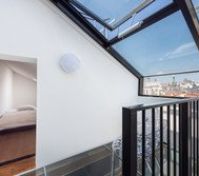 Glass terrace with bedroom and view