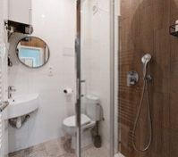 Bathroom with shower and toilet