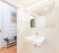 Bathroom leading to hallway