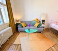 Sofa with teal coffee table