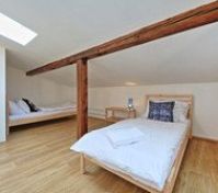 2nd attic bedroom with 2x single beds and 2nd bathroom