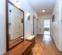 Shared Hallway with mirror and parquet