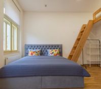 Bedroom with double bed and loft