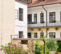 Courtyard with statue and flowers