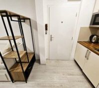 Studio entrance with kitchenette area
