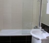 bathroom of the main bedroom with a hot tub