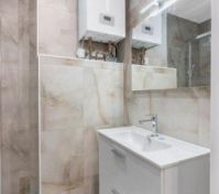 Bathroom vanity sink and boiler