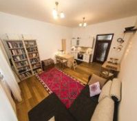 the living room with kitchen corner. 