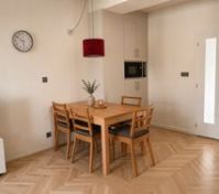 Dining area with herringbone floor